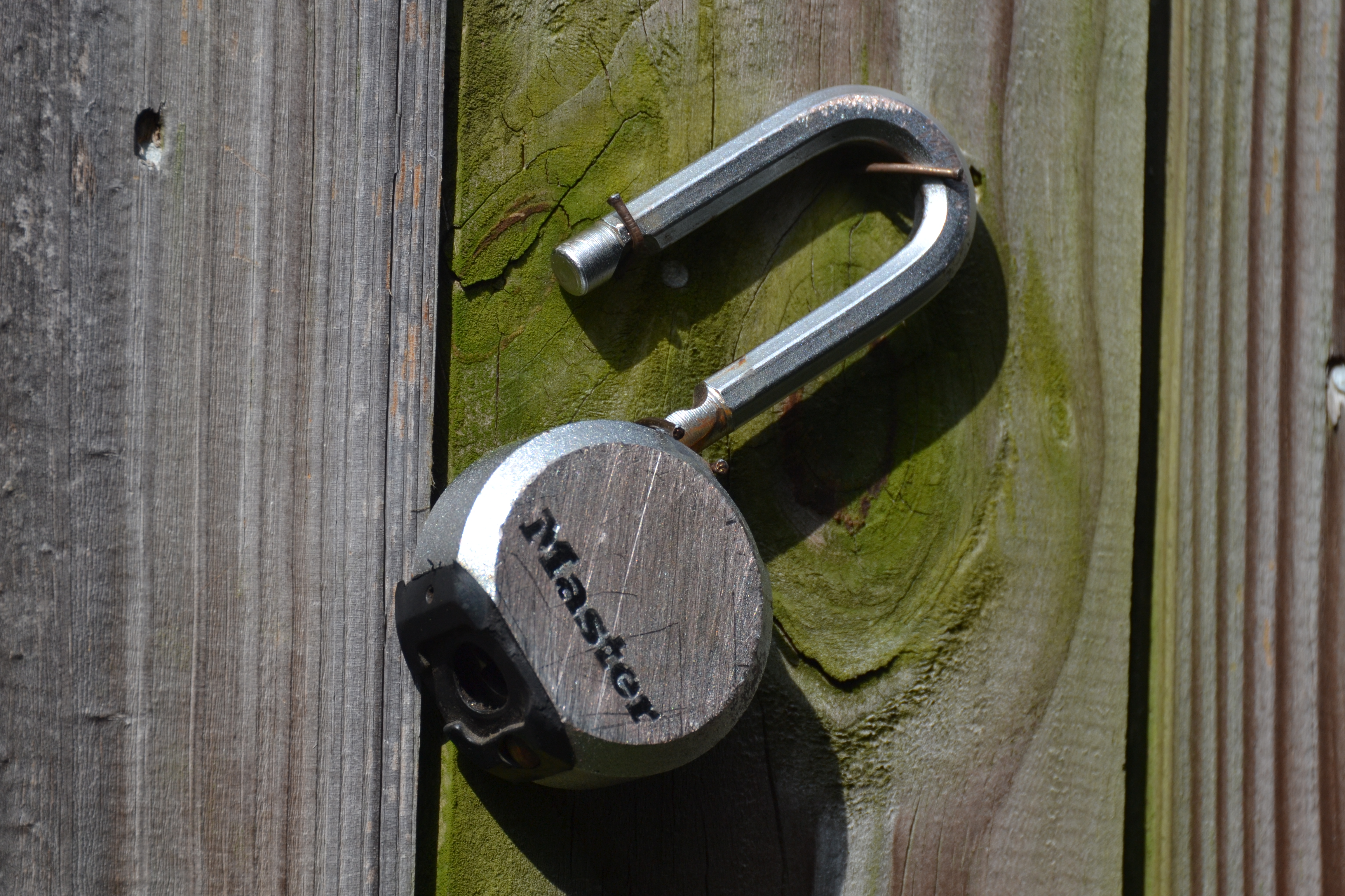 Laminated steel padlock